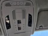 a view of the inside of a car from the driver ' s seat