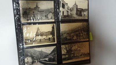a picture of a display of old photos on the wall