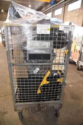 a metal cart with a bunch of electronics on top of it