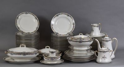 a lot of plates and cups on the table