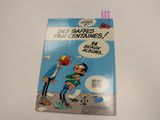cartoon book on a white table with a sticker on it