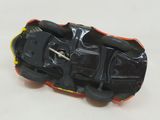 a toy car that is sitting on a white surface