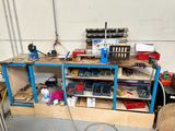 a workbench that has a lot of tools on it