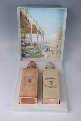 two wooden boxes that are sitting on a table