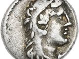 une pièce de monnaie en argent portant un visage de femme