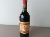 a bottle of wine that is sitting on a table