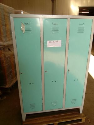 two lockers sitting on a pallet in a warehouse