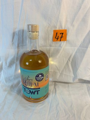 a bottle of alcohol that is sitting on a table