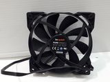 a black computer fan sitting on top of a white table