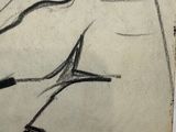 a drawing of a woman sitting on a bed