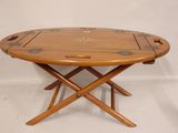 an image of a wooden folding table with four legs