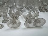 a lot of empty wine glasses on the table