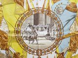 a scarf with a picture of a horse and carriage on it