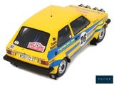 a toy car that is yellow and blue with a number on it