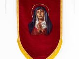 an image of a red and gold banner with a picture of a woman holding a rosary