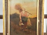 tableau représentant une femme portant un panier de blé, posé sur un chevalet en bois