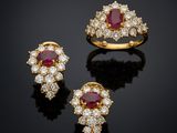 un ensemble composé d'une bague et d'une boucle d'oreille en rubis et diamants