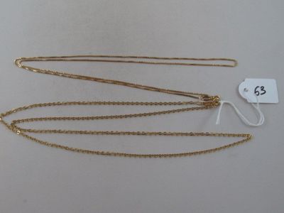 three gold chain necklaces on a white background with a price tag