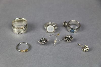 a lot of rings that are sitting on a table