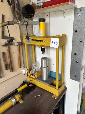 a workbench with tools on it in a garage