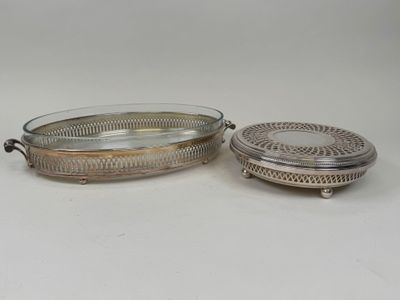 two silverplated serving dishes with lids and handles