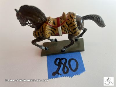 une figurine représentant un cheval sur laquelle figure un numéro
