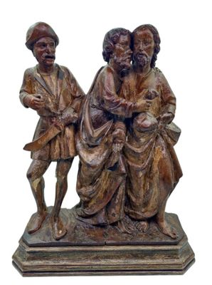 statue représentant deux hommes assis sur un banc avec un chien