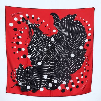 red and black polka dot print scarf with black and white polka dots on a red background
