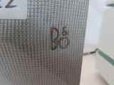 a close up picture of a laptop computer with the letter b on it