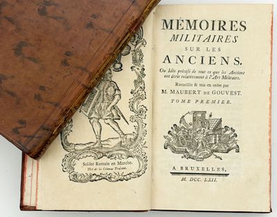 an old book with a picture of a man riding a horse