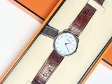 a watch that is sitting in a box on a table