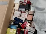 a cardboard box filled with many different types of electronic devices