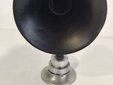 a black object that is on top of a white table