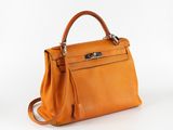 hermes handbag in orange leather with silver hardware