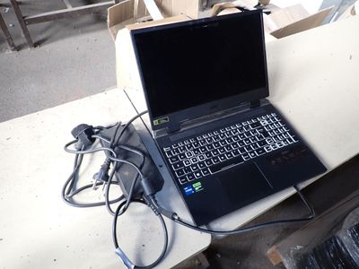 a laptop computer that is sitting on a table
