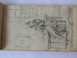 an old book with a drawing of a man sitting on a bench