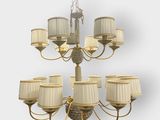 a large chandelier with twelve lamps and a chandelier shade
