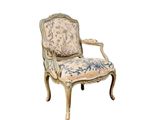 an image of a chair with a floral upholstered back