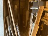 several pieces of wood are stacked on top of each other in a room
