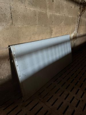 a radiator that is sitting in the corner of a room