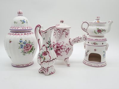 three different types of teapots on a white background