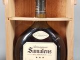 an image of a bottle of samalens in a wooden box