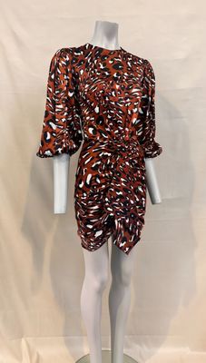 an image of a mannequin wearing a brown and white dress