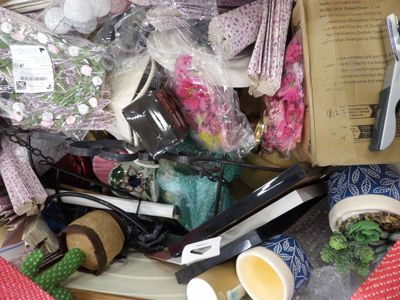 a pile of assorted items sitting on a table