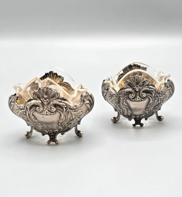 paire de sucriers et de beurriers plaqués argent sur socles
