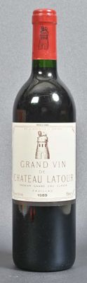 a bottle of wine that is sitting on a table
