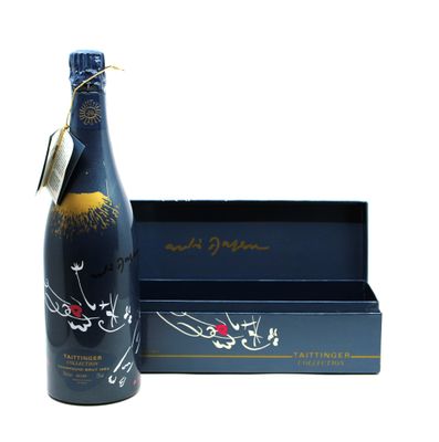 a bottle of wine that is sitting next to a box