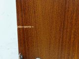 an image of a wooden door with a lock
