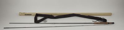 two fishing rods and a fishing rod on a white surface