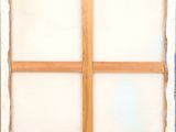 a picture of a picture of a window with a cross on it